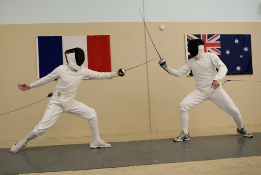 photo of two fencers in TT club